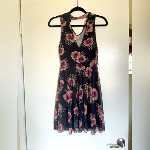 New with tags! Never worn. Black and pink floral dress.